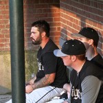 Rick Blais, Walter Klimczak, and Luke Palma on the Knights bench