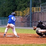 Brian reaches for the foul tip