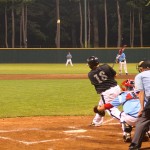 Scott Dickens drops a hit in right field